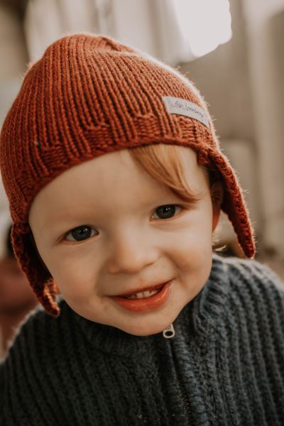 Knitted Hat with Earflaps in Merino Wool rust