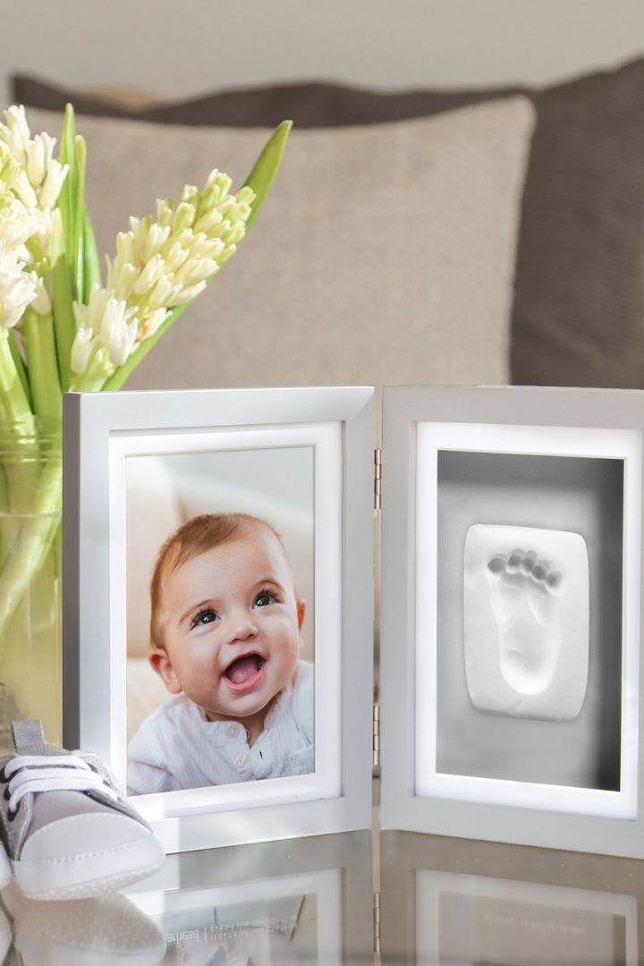 Stand-up picture frame with baby impression set, grey background