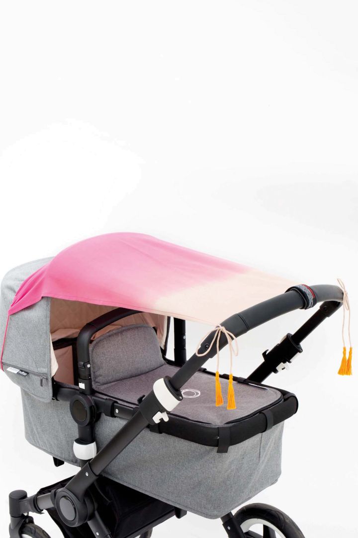 Kinderwagen Sonnenschutz pink in Dip Dye Optik